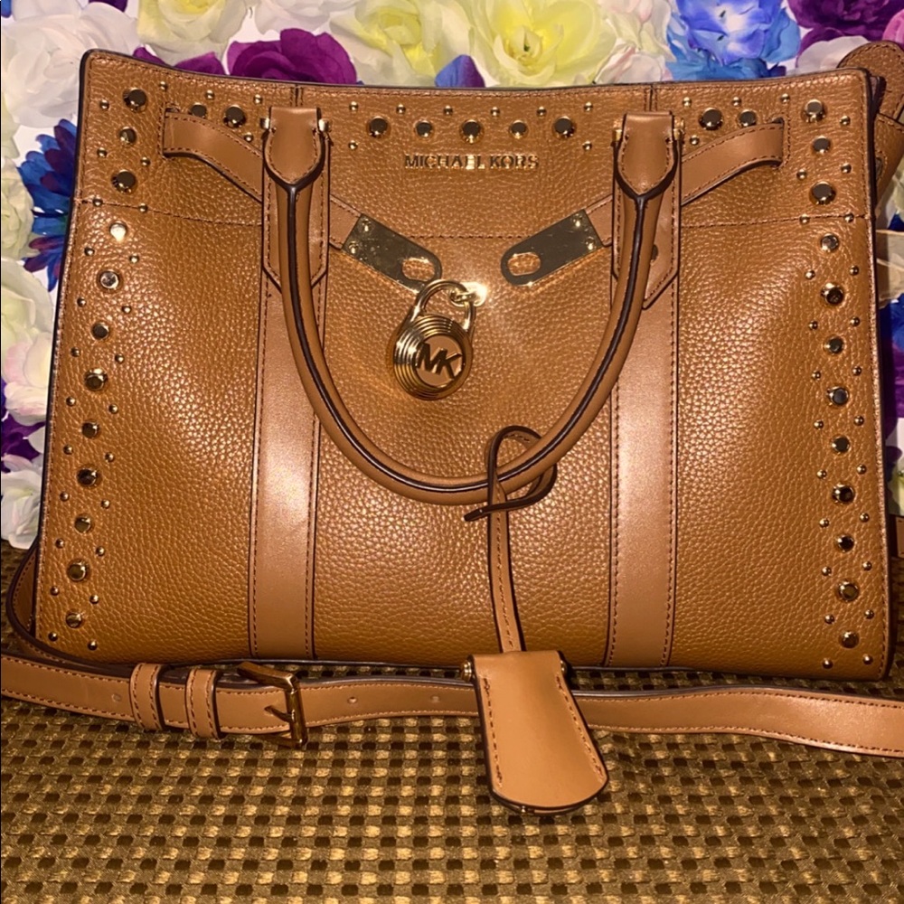Large leather studded Michael Kors handle bag. removable crossbody strap.